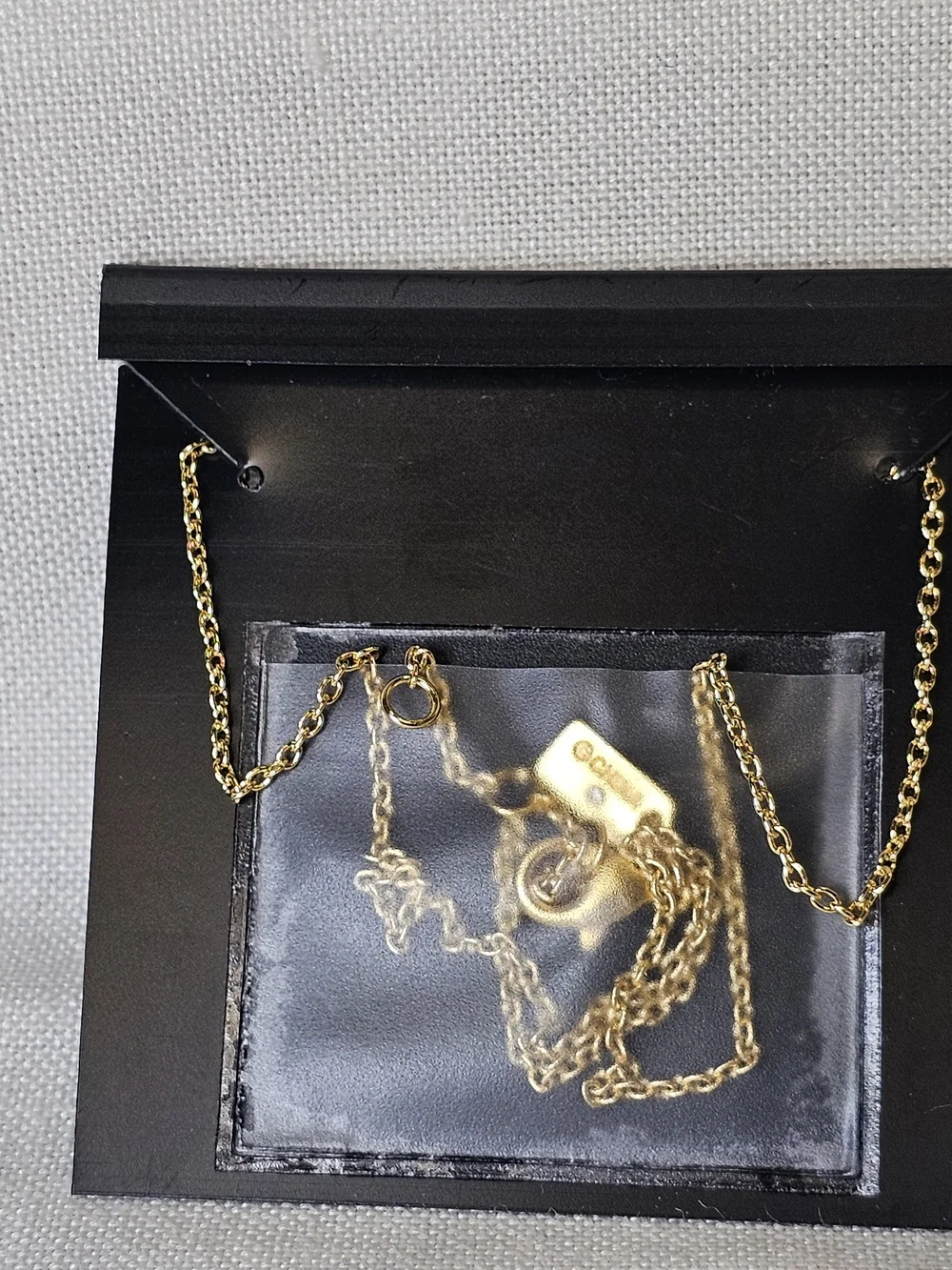 COACH Gold and Black Pendant Necklace with Crystal Accents